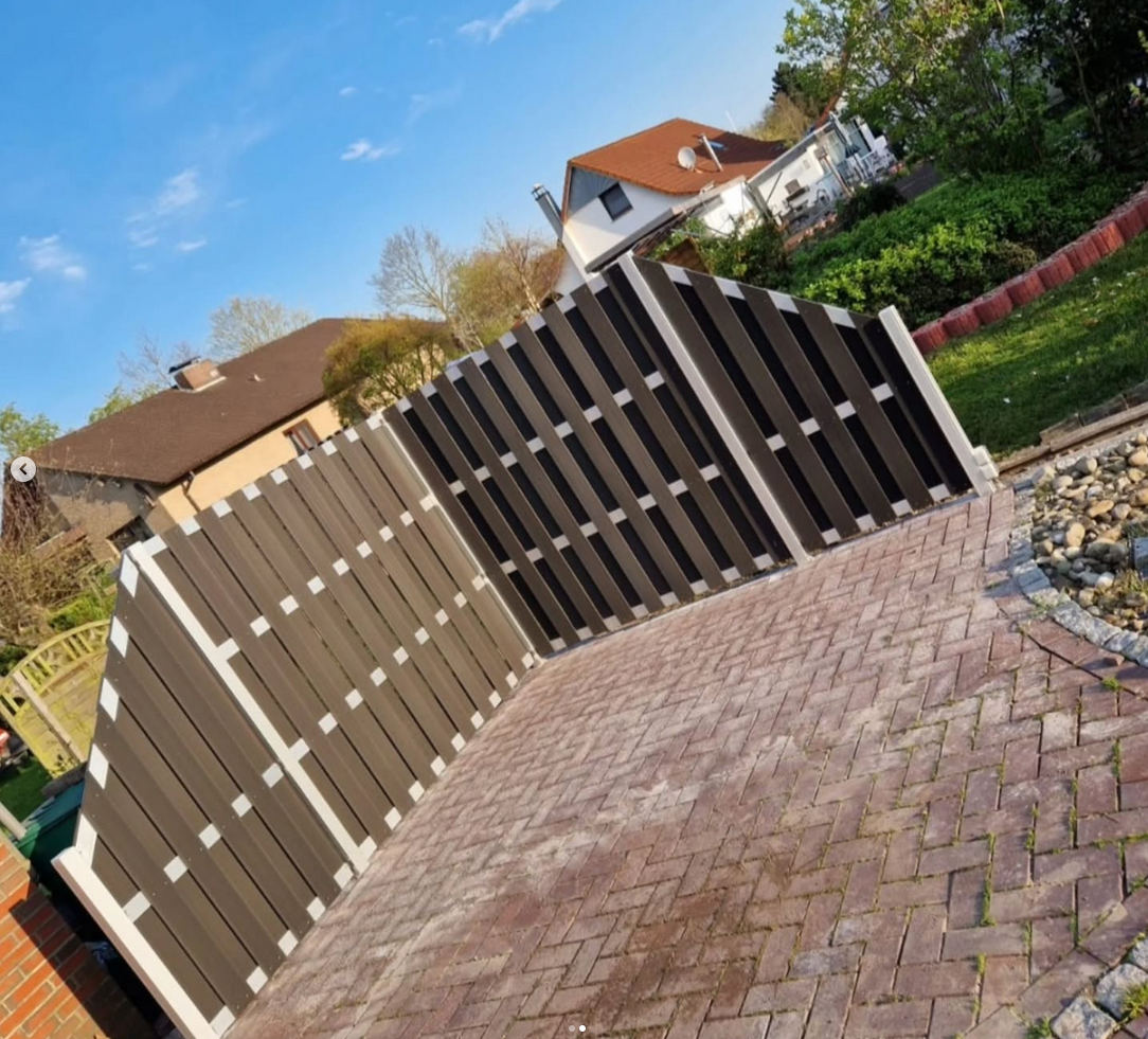 Nachher: Terrasse mit modernem Sichtschutzzaun